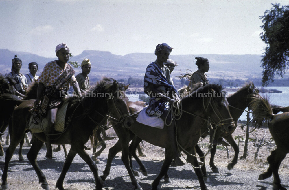 DP109_12 - A snapshot of horse riders, Waingapu, Sumba, Indonesia.